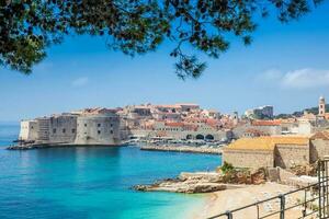 The beautiful Banje Beach and Dubrovnik city photo