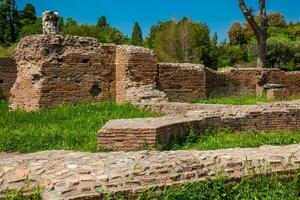 detalle de el paredes de el restos a el flavio palacio además conocido como el domus flavia en el palatino colina en Roma foto