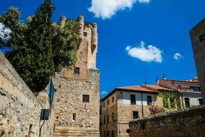 The historical Clavero Tower built on the fifteenth century in the city of Salamaca in Spain photo