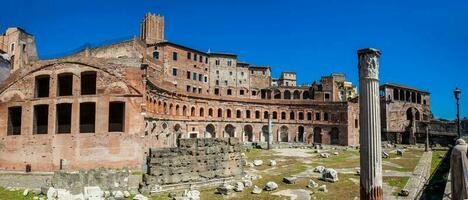 Panoramic view of the ancient ruins of the Market of Trajan thought to be the oldest shopping mall of the world built in 100-110 AD in the city of Rome photo