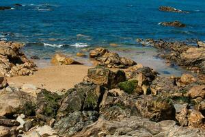 Sunny day at the beautiful coastline and beaches at Porto city in Portugal photo