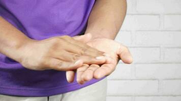 a person holding their hand up to their palm video