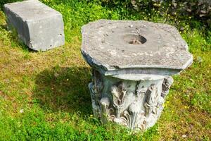 Remains of columns of the ancient buildings at the Roman Forum in Rome photo