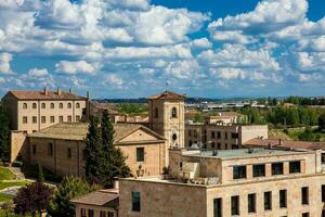 View of the beautiful Salamanca old city and the Church of Carmen de Abajo built on the 15th century photo