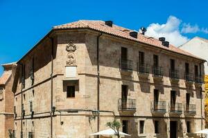 Beautiful architecture of the antique buildings around at Calle Melendez in Salamanca old city photo