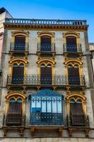 Beautiful architecture of the antique buildings around the square of the Poet Iglesias at Salamanca old city photo