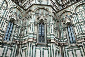 Facade of the beautiful Florence Cathedral consecrated in 1436 photo