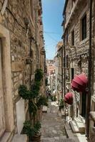 The beautiful steep alleys at the walled old town of Dubrovnik photo