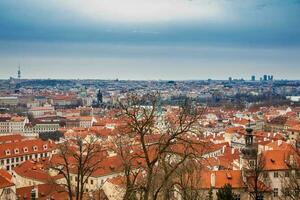 The beautiful Prague city old town seen form the Prague Castle viewpoint in an early spring day photo