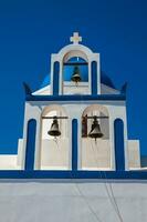 The Profitis Ilias church located next to walking path Number 9 between Fira and Oia in Santorini Island photo