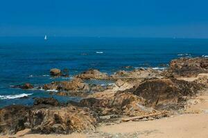 Sunny early spring day at the beautiful beaches along the Porto city coast photo