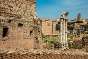 Remains of the Temple of Castor and Pollux or the Dioscuri at the Roman Forum in Rome photo