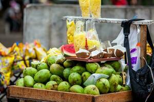 Street sell of tropical fruits in the city of Cali in Colombia photo