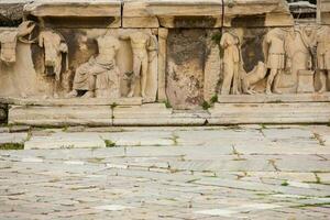 detalle de el relieves cuales decoramos el teatro de dioniso eleuterio el mayor teatro en Atenas con fecha de a el 6to siglo antes de Cristo foto