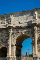 The Arch of Constantine a triumphal arch in Rome, situated between the Colosseum and the Palatine Hill built on the year 315 AD photo