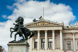 The historical Austrian Parliament Building completed in 1883 and located on the Ringstrabe boulevard in the first district of Vienna photo