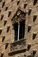 Detail of the windows of the historical House of the Shells built in 1517 by Rodrigo Arias de Maldonado knight of the Order of Santiago de Compostela in Salamanca, Spain photo