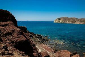 Famous Red Beach at Santorini Island in a beautiful early spring day photo