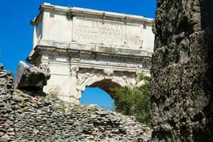 The Arch of Titus an honorific arch built on the 1st-century AD located on the Via Sacra in Rome photo