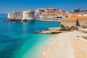 The beautiful Banje Beach and Dubrovnik city photo