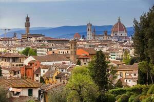 View of the beautiful city of Florence from the Giardino delle rose in an early spring day photo