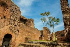 Detail of the walls of the ruins along the Via Nova on the Roman Forum in Rome photo