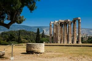 Ruins of the Temple of Olympian Zeus also known as the Olympieion at the center of the Athens city in Greece photo