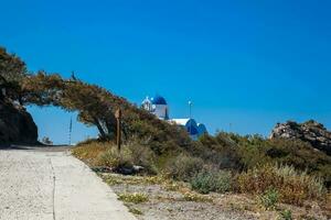 Walking path No. 9 between Fira and Oia and Profitis Ilias church in Santorini Island photo