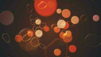 abstrato retro bokeh fundo com marrom, laranja e bege plástico efeito esferas e anel rabiscos. isto vintage líquido movimento estilo fundo animação é cheio hd e uma desatado laço. video