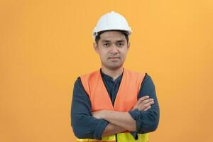 inspector, engineer, Foreman or contactor proudly crosses his arms to inspect the quality of his work. architects work to build the house before handing it over to the homeowner. Develop new estate. photo