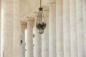 Detail of the beautirul Doric colonnade at St. Peter Square on the Vatican City in Rome photo