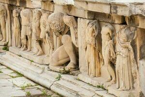 detalle de el relieves cuales decoramos el teatro de dioniso eleuterio el mayor teatro en Atenas con fecha de a el 6to siglo antes de Cristo foto