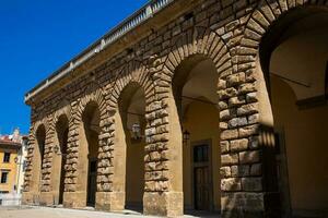 Detail of the facade of the famous renaissance Palazzo Pitti in Florence photo