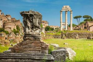 Remains of the Basilica Julia and the Temple of Castor and Pollux at the Roman Forum in Rome photo