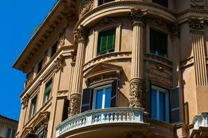 Beautiful architecture of the antique buildings at Rome city center photo