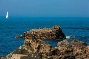 Sunny day at the beautiful coastline and beaches at Porto city in Portugal photo