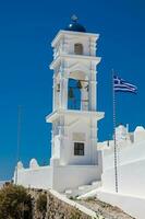 Typical alleys of the beautiful cities of Santorini Island photo