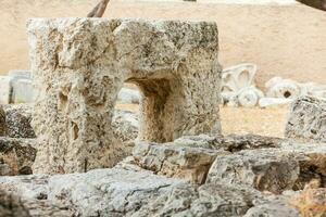 Ancient ruins on the south face of the Acropolis Hill in Athens city photo