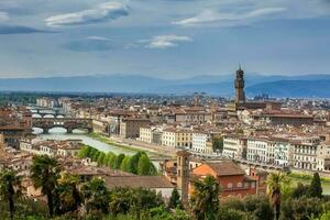 View of Ponte Vecchio and the beautiful city of Florence from Michelangelo Square photo