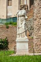 Ancient ruins of the House of the Vestal Virgins at the Roman Forum in Rome photo