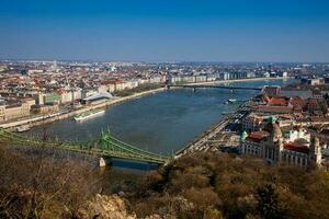 View of the beautiful Budapest city and Danube river under the blue sky photo