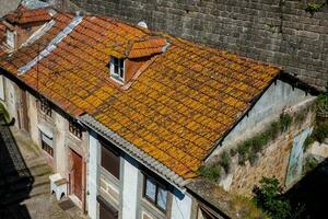 Architecture of the antique houses at the old city of Porto in Portugal photo