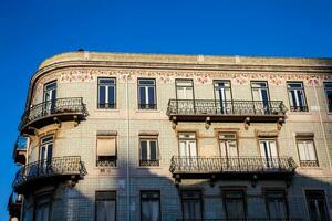 Beautiful architecture of the antique buildings at Lisbon city center photo