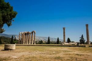 Ruins of the Temple of Olympian Zeus also known as the Olympieion at the center of the Athens city in Greece photo