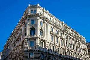 Beautiful architecture of the antique buildings at Rome city center photo