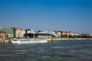 View of the beautiful Budapest city and Danube river under the blue sky photo