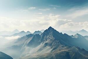high mountain landscape images covered with snow and clouds photo