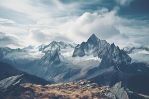high mountain landscape images covered with snow and clouds photo