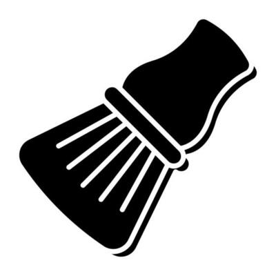 A solid design icon of shaving brush
