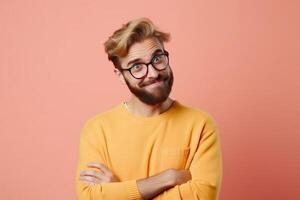 Portrait of a confused young man over solid background photo